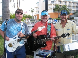 Howard (center) with MM24 band members Jason Miller and Dave Herzog.